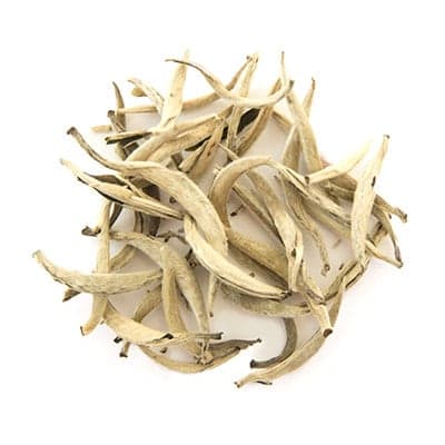 a loose circular grouping of white silverneedle tea
